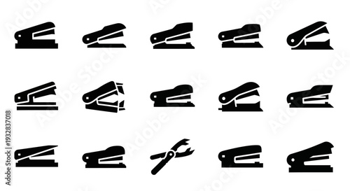 Collection of black office clips and scissors arranged neatly on a plain white background from a direct overhead viewpoint