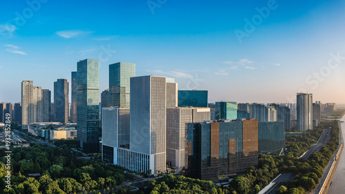 Obraz na plátně Aerial view of modern office buildings and a green park in the CBD of Hangzhou, China