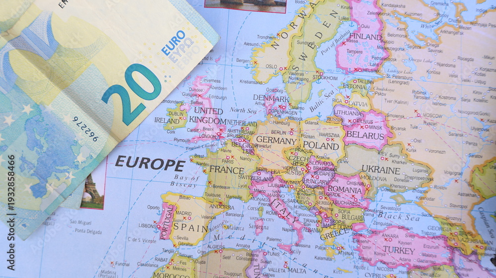 Naklejka premium Euro Bill on Europe Map - Travel and Economy Concept