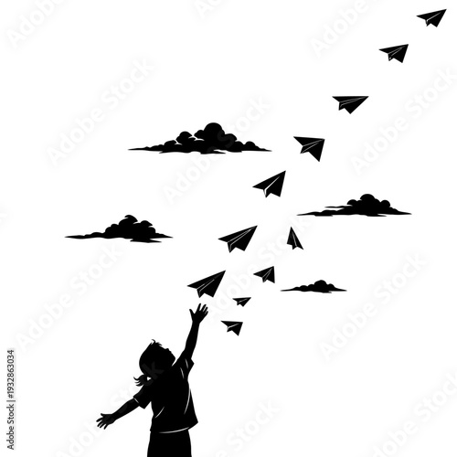 A silhouette of a person releasing paper airplanes into the air
