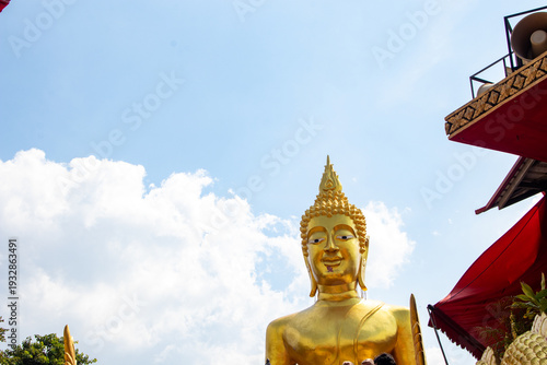 Tableau sur toile A Phra Phrom shrine, a type of spirit house common in Thailand that contains a golden statue of the Hindu deity Brahma, known for having four faces