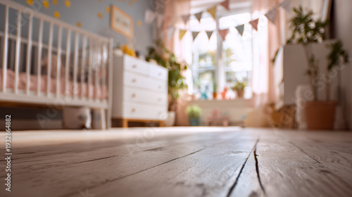 Warm and cozy baby nursery with wooden floor, soft natural lighting, pastel-colored decor, a crib, dresser, and playful bunting flags for a welcoming atmosphere
