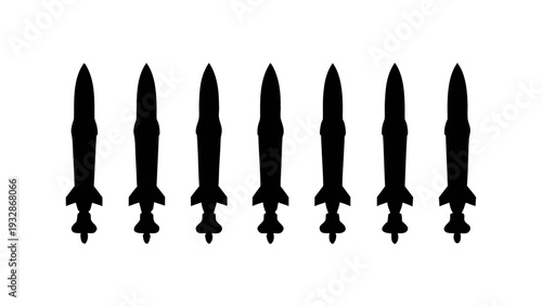 A set of seven black missile silhouettes arranged in a row on a white background