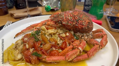 a delicious plate of spaghetti with spider crab and red and yellow cherry tomatoes from Vesuvius