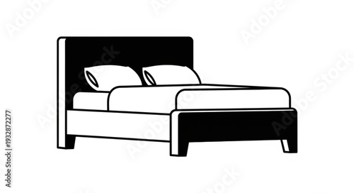 Elegant black and white bed with pillows, perfect for bedroom decor and comfortable sleep.