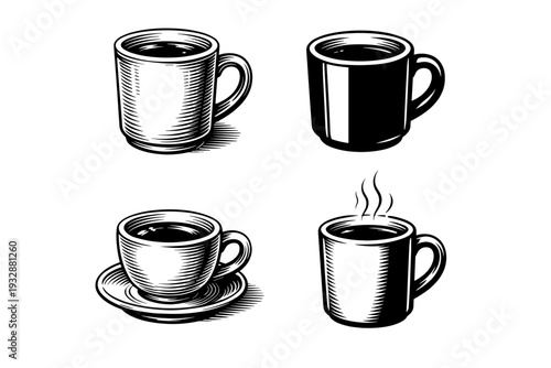 Set of four black and white coffee mugs and cups