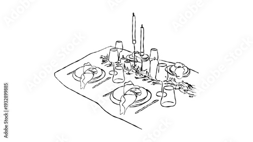 Elegant dining table setting with wine glasses and candles