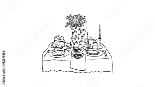 Elegant table setting with dinnerware and candle