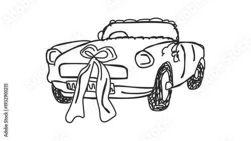 Vintage convertible car with a big bow on the front