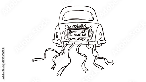 Newlywed car with just married sign and ribbons