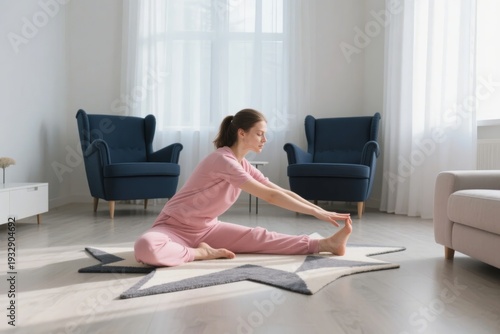Woman practicing stretching exercises on a yoga mat in a bright, modern living room