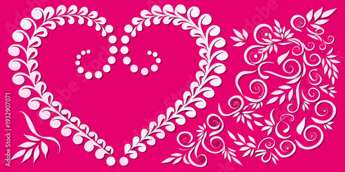 A delicate pink heart shape adorned with floral and swirling elements