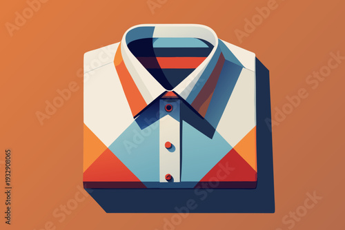 Colorful geometric patterned folded shirt on orange background showcasing abstract design and modern fashion aesthetic with crisp collared detail