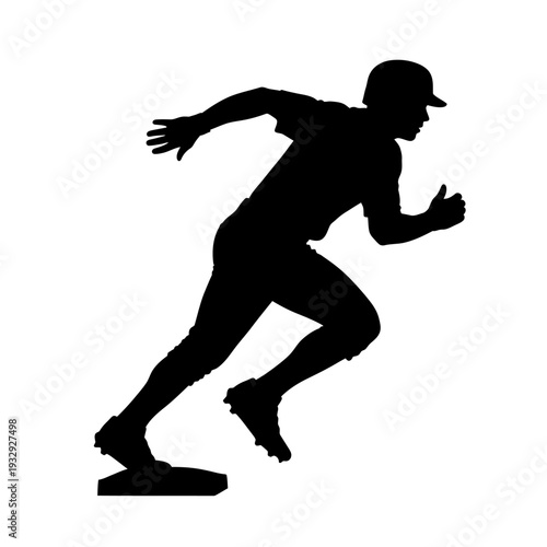 Silhouette of a Baseball Player Running Towards the Base.