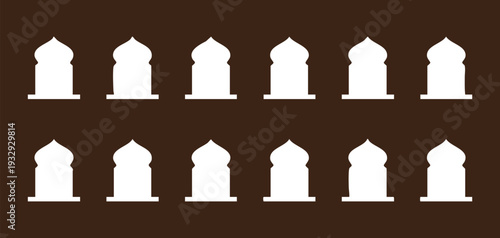 Ten white fire hydrants on brown background