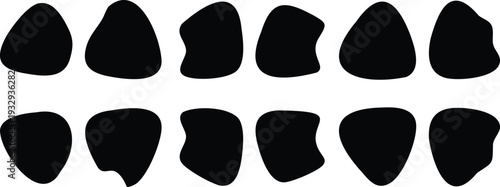 Black silhouettes of teeth on white background