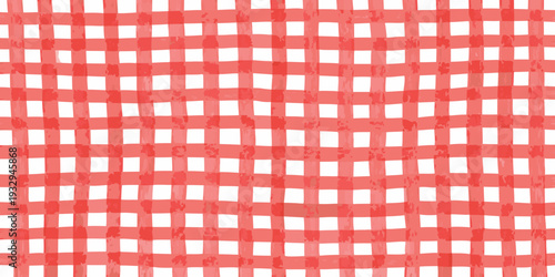 A seamless pattern of red and white checkered squares slightly textured