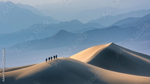 Silhouetted group hiking desert landscape
