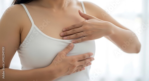 Wallpaper Mural Woman Performing Breast Self-Examination For Cancer Awareness And Early Detection Healthcare Concept In Bright Room Torontodigital.ca