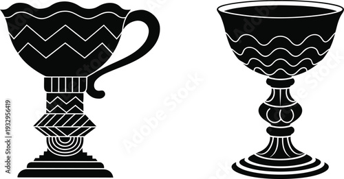 Two black and white ancient Greek drinking vessels with intricate patterns and handles 1