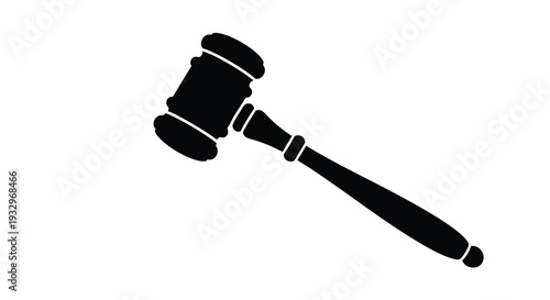 A stark black silhouette of a traditional gavel and block representing law order and judicial proceedings silhouette high quality