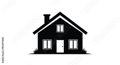 A simple black silhouette of a classic house with a chimney and small lawn creating a stark contrast silhouette