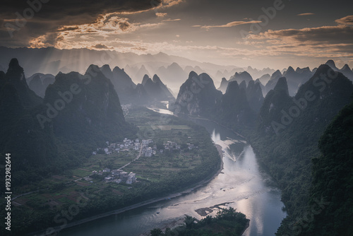 фотографія Panoramic sunrise over the Karst mountain natural landscape from Xianggong Mount