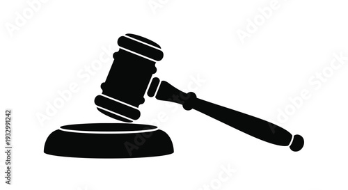 A stark black silhouette of a traditional gavel resting on a sound block symbolizing justice and legal proceedings silhouette