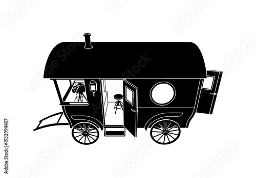 Vintage caravan with people inside on wheels