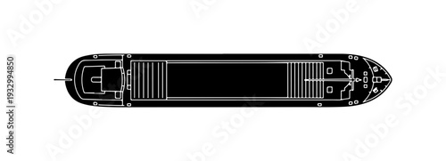 Sleek cargo ship sailing through open waters at night