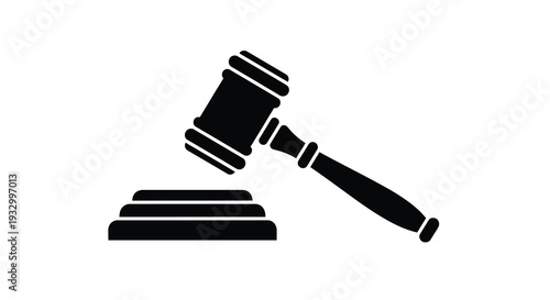A stark black silhouette depicts a gavel resting on a sound block symbolizing justice and legal proceedings silhouette