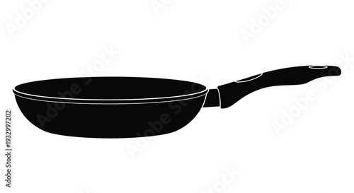 A stark black silhouette of a frying pan against a white background highlighting its simple kitchen utility silhouette