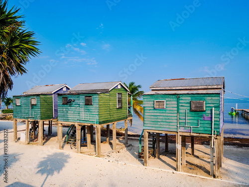 Traditional stilt houses at the waterfront of Caye Caulker, Belize District, Belize
