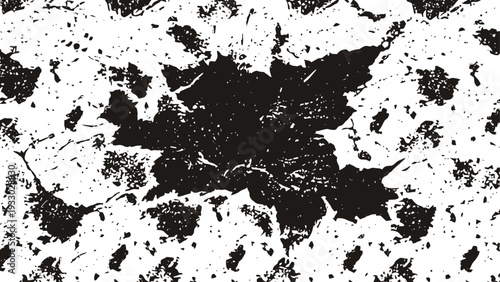 Grunge black maple leaf silhouette with distressed texture and scattered splatter spots