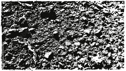 Rough black and white gravel texture background with rocky uneven surface pattern