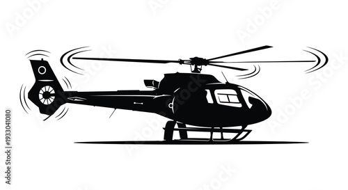 A sleek black helicopter in flight with blurred rotor blades and landing skids