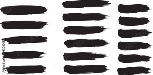 Collection of black brush strokes and marks on a white background