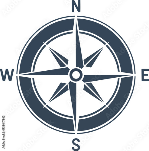 A cobalt blue compass rose illustration on a circular navigation symbol