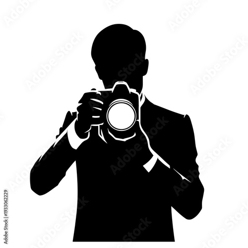 Silhouette photographer holding camera taking photo