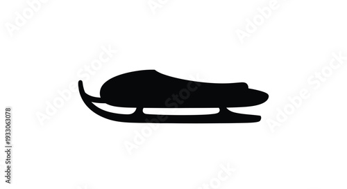 A striking black silhouette of a classic ice skate