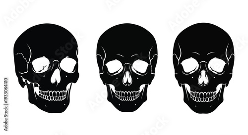 Three black skull shapes arranged in a row stark silhouette