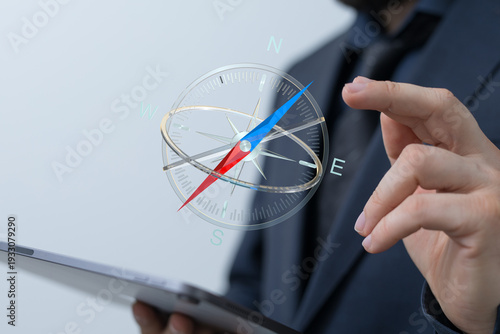 Businessman holding tablet ...
