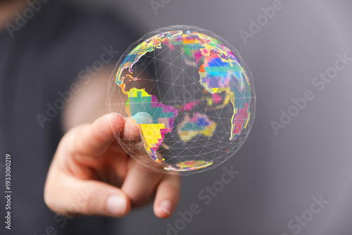 Person holding a colorful g...