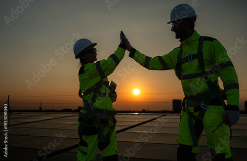 Wallpaper Mural Engineers celebrating successful solar panel installation Torontodigital.ca