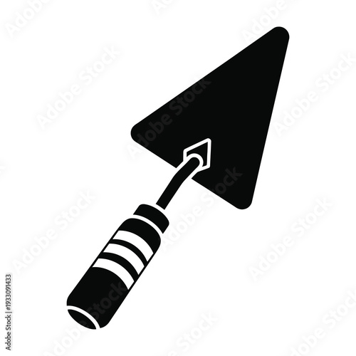 Pointed mason trowel ready for precision bricklaying and construction work