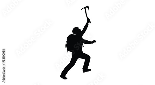 A triumphant climber raises an ice axe in a dark silhouette
