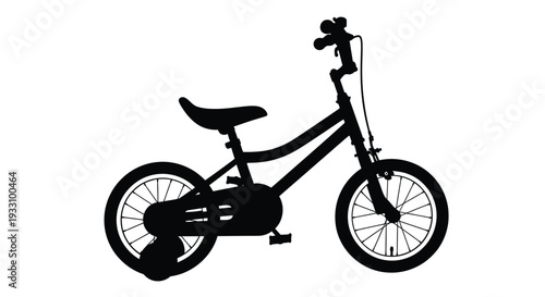 Black silhouette of a child s bicycle against a white background silhouette