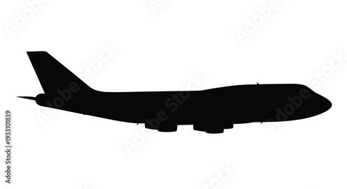 A striking black silhouette of a large passenger airplane