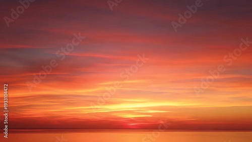 Beautiful Sunset Sky Over the Ocean Horizon with Orange and Red Colors.