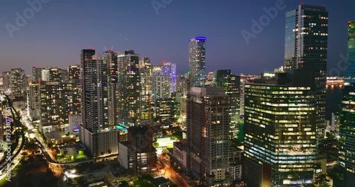 Downtown district of Miami Brickell in Florida, USA at night. Urban landscape of high-rise buildings in modern American megapolis.